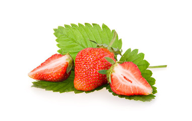 Red sliced strawberry fruits with green leaves