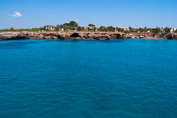 Naklejka na ściany i meble Turquoise waters of Mediterranean Sea at Cala Mendia, Majorca i