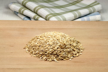 oat flakes on wood board