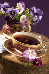bunch of flowers pansies in a jar of