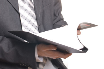 business man holding stack of files and folders
