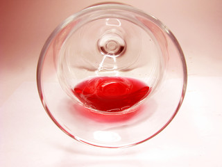 pouring goblet of red wine