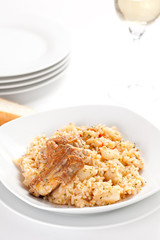 plate of rice and pork chops potatoes