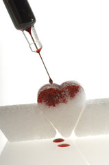 Würflezucker Spritze mit Blut und Herz aus Zucker