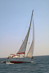 Obraz na płótnie Canvas Turning sailing boat