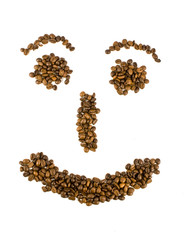 Smile from coffee beans isolated on white