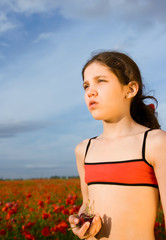Portrait teen girl with cherry