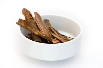 Bunch Cinnamon sticks over white background