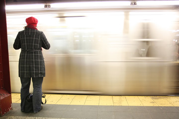 Person waiting for the subway in Manhattan New York