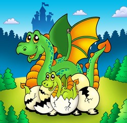 Naklejka premium Dragon mom with baby in forest