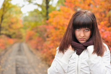 The girl in an autumn forest