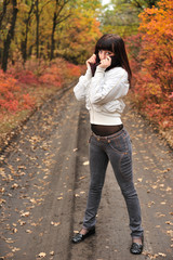 The girl in an autumn forest