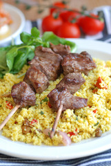 Pork kebabs with couscous