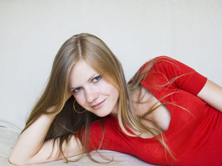Beautiful girl lying on the couch