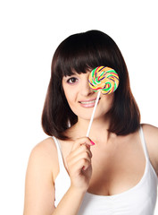 girl with lollipop smiling