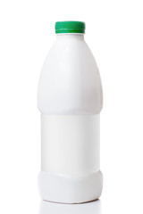 bottle of milk with a green cap isolated on white background