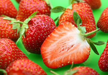 Strawberry berry on green