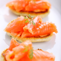 delicious appetizer with salmon pancakes