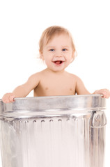 baby in trash can