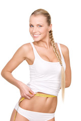 Obraz premium beautiful woman with measure tape