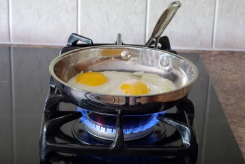 Foto auf Acrylglas Spiegeleier Eier kochen
