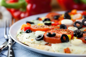 Pizza with mozzarella cheese and vegetables