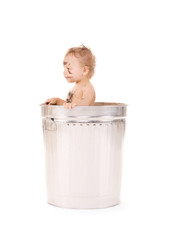 baby in trash can