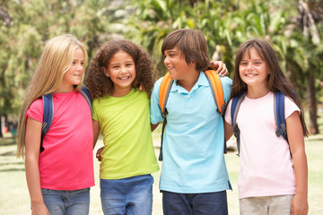 Group Of Schoolchildren Standing In Park