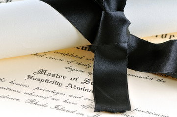 Graduation diploma isolated on a white background.