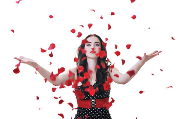 Fototapeta na wymiar woman with falling rose petals