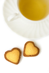 Green tea and heart shaped biscuits