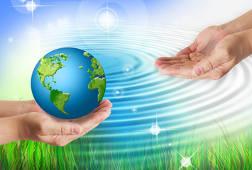 Hands holding globe. Environmental energy concept.