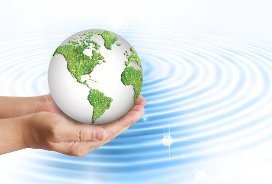 Hands holding globe. Environmental energy concept.