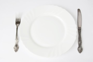 fork and knife with plate.