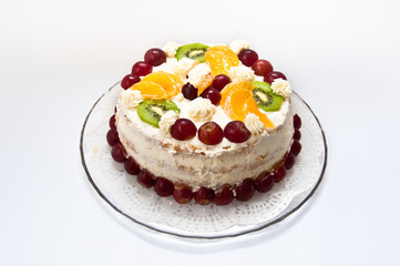 Fruit and whipped cream birthday cake