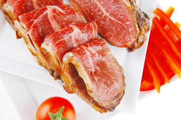 beef rolls and chunk on white