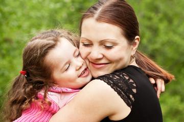 Fototapeta premium Mother and the daughter on nature