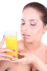 woman with glass of orange juice