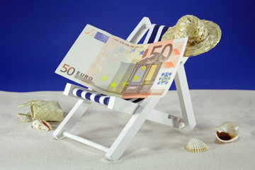 euroschein auf sonnenliege