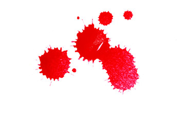 red ink blot on white background