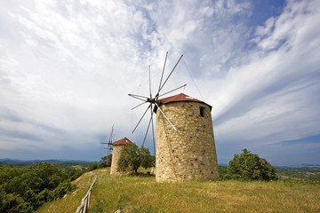 Traditional  built with stones windmill in Greece