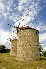 Traditional  built with stones windmill in Greece