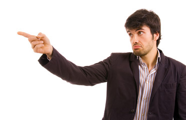 young atractive man pointing with is finger, isolated on white