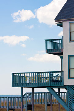 House with balcony near the ocean
