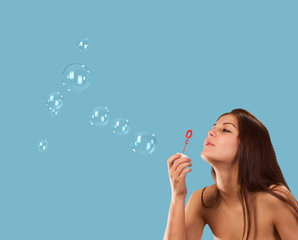 Girl with soap bubbles