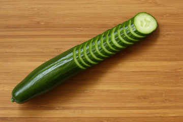 Cucumber on cutting board.