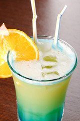 Summer drink decorated with a slice of orange