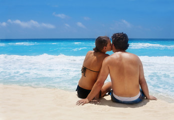 Young Couple enjoying a Romantic Beach Getaway