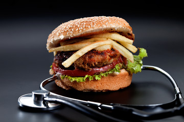 Hamburger with stethoscope