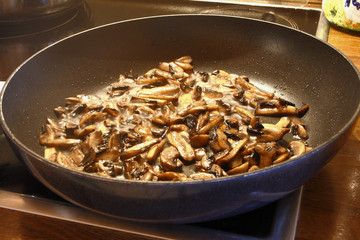 mushrooms on the frying pan